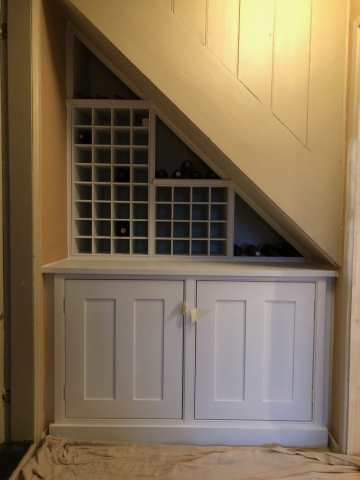 Spandrel cupboard storage