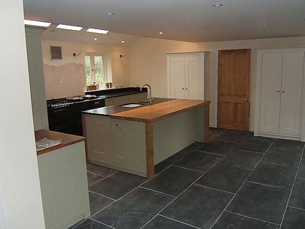 Shaker style oak, stone and panelled kitchen