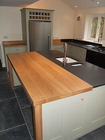 Shaker style oak, stone and panelled kitchen
